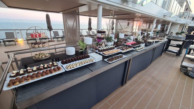 One table of the Chocolate Extravaganza night by the pool